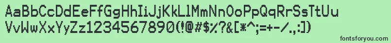 フォントKarmasuture – 緑の背景に黒い文字