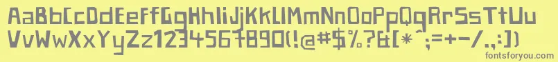 フォントPaperjohnnyeinhalbRegular – 黄色の背景に灰色の文字