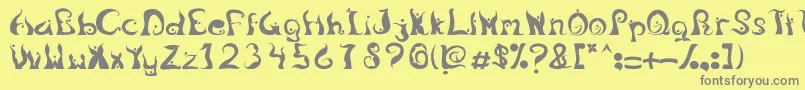 Fonte LegongDancingfont – fontes cinzas em um fundo amarelo