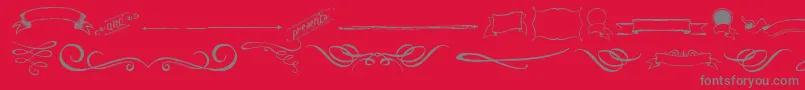 ChalkHandElements-Schriftart – Graue Schriften auf rotem Hintergrund