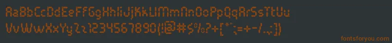 Fonte PocketCalcuatlorTt – fontes marrons em um fundo preto