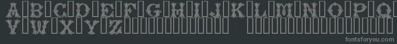 PurcellTM-fontti – harmaat kirjasimet mustalla taustalla