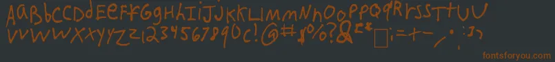 IEatCrayons-fontti – ruskeat fontit mustalla taustalla
