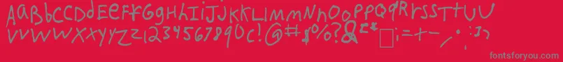 IEatCrayons-fontti – harmaat kirjasimet punaisella taustalla