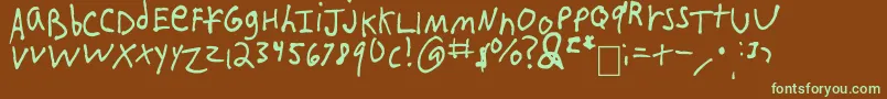 フォントIEatCrayons – 緑色の文字が茶色の背景にあります。
