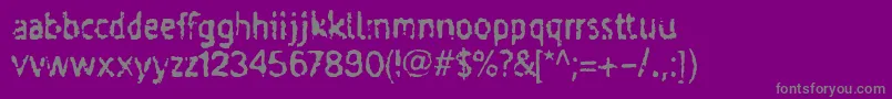 Taigatru-fontti – harmaat kirjasimet violetilla taustalla
