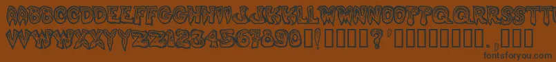 PhlegmyKilmister Font – Black Fonts on Brown Background