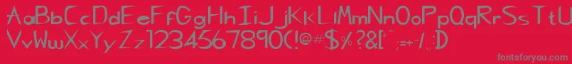 フォントCharliechanRegular – 赤い背景に灰色の文字