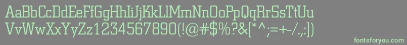 フォントColiseumlightc – 灰色の背景に緑のフォント
