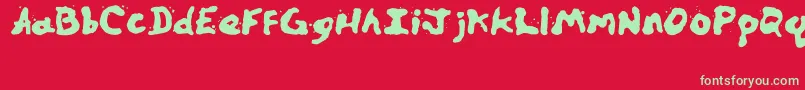 Zillspills-Schriftart – Grüne Schriften auf rotem Hintergrund