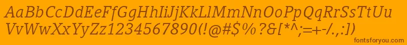 フォントCompatilLetterLtComItalic – オレンジの背景に茶色のフォント