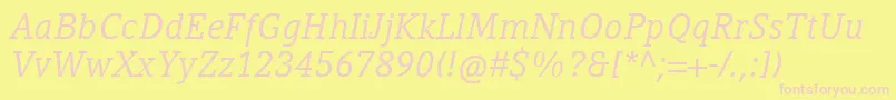 CompatilLetterLtComItalic-fontti – vaaleanpunaiset fontit keltaisella taustalla