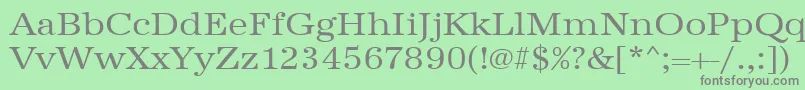 フォントUrwantiquatextwid – 緑の背景に灰色の文字