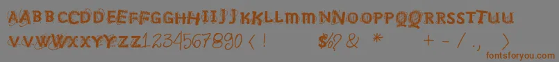 フォントVtksnosignal – 茶色の文字が灰色の背景にあります。