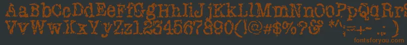 Newyorkpunk Font – Brown Fonts on Black Background