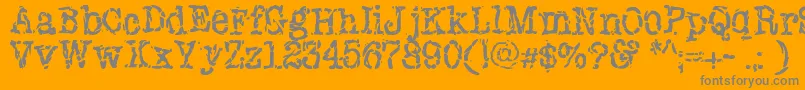 Newyorkpunk-Schriftart – Graue Schriften auf orangefarbenem Hintergrund