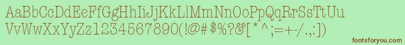 KeyboardLightCondensedaltSsiLightCondensedAlternate-fontti – ruskeat fontit vihreällä taustalla