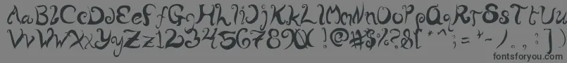 WurlyFool-fontti – mustat fontit harmaalla taustalla
