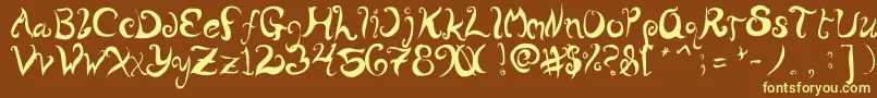 WurlyFool-fontti – keltaiset fontit ruskealla taustalla