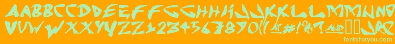 Czcionka Jrandomc – zielone czcionki na pomarańczowym tle