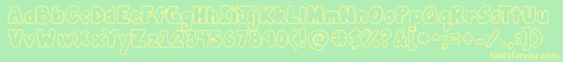 フォントJandamanateebubble – 黄色の文字が緑の背景にあります