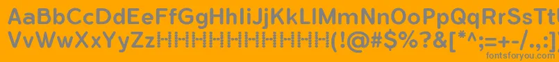 FlamanteRoundMediumFfp-fontti – harmaat kirjasimet oranssilla taustalla
