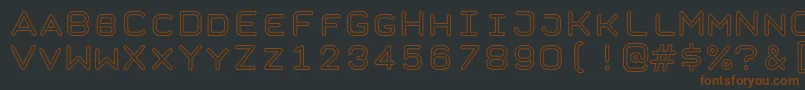 TaurusMonoOutlineRegular-fontti – ruskeat fontit mustalla taustalla