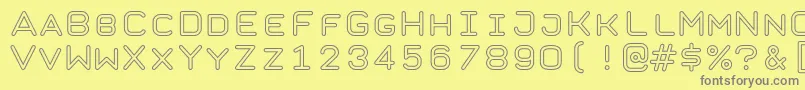 TaurusMonoOutlineRegular Font – Gray Fonts on Yellow Background