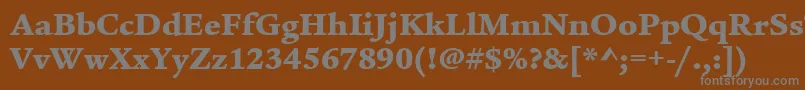 ItcLegacySerifLtUltra-fontti – harmaat kirjasimet ruskealla taustalla