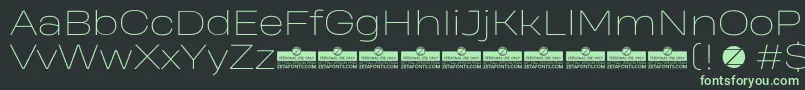 HeadingProWideThinTrial Font – Green Fonts on Black Background