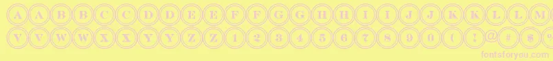ADiscoserifdbl-fontti – vaaleanpunaiset fontit keltaisella taustalla