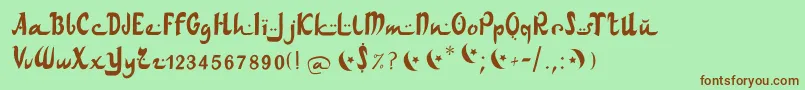 Шрифт Arabdancesmediumitalic – коричневые шрифты на зелёном фоне