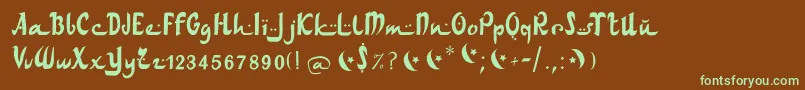 フォントArabdancesmediumitalic – 緑色の文字が茶色の背景にあります。