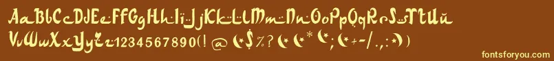 Шрифт Arabdancesmediumitalic – жёлтые шрифты на коричневом фоне