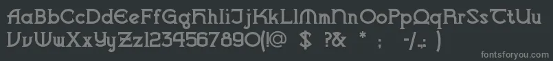 Vlaanderenchiseled-fontti – harmaat kirjasimet mustalla taustalla