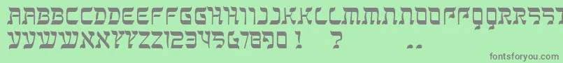 フォントKanisah – 緑の背景に灰色の文字