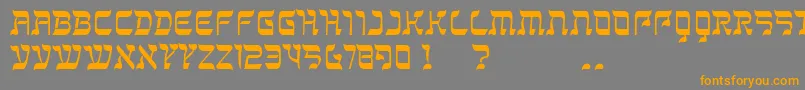 フォントKanisah – オレンジの文字は灰色の背景にあります。