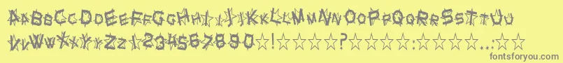 SfStarDustCondensed-fontti – harmaat kirjasimet keltaisella taustalla