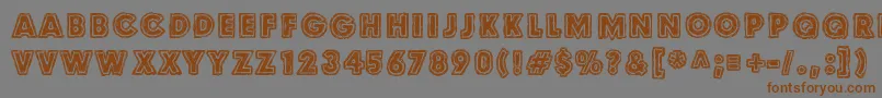 フォントCuldesac – 茶色の文字が灰色の背景にあります。