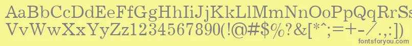 フォントJournalPlain.001.001 – 黄色の背景に灰色の文字