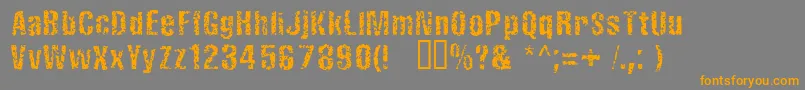 フォントFistrorattedNormal – オレンジの文字は灰色の背景にあります。