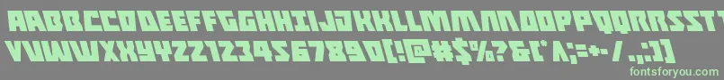 Halfshellheroleft-Schriftart – Grüne Schriften auf grauem Hintergrund