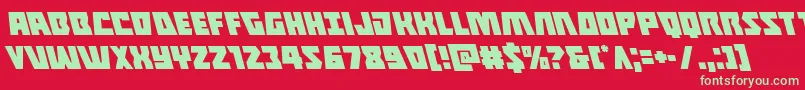 Halfshellheroleft-Schriftart – Grüne Schriften auf rotem Hintergrund