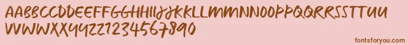 CaputTrial-Schriftart – Braune Schriften auf rosa Hintergrund