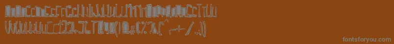 TrojasciptBold Font – Gray Fonts on Brown Background