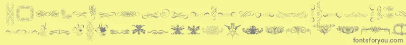 CornucopiaOfOrnaments-Schriftart – Graue Schriften auf gelbem Hintergrund