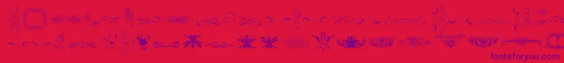 Шрифт CornucopiaOfOrnaments – фиолетовые шрифты на красном фоне