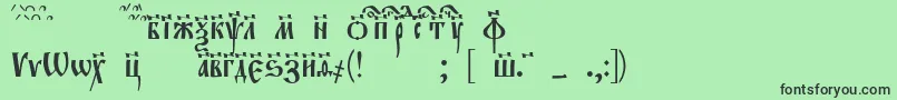 フォントEvangeliett – 緑の背景に黒い文字