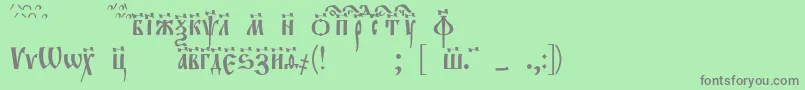 フォントEvangeliett – 緑の背景に灰色の文字