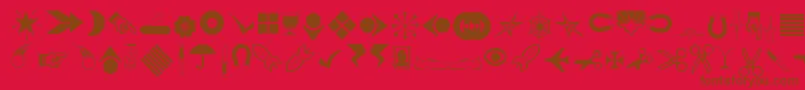 Journaldingbats3-Schriftart – Braune Schriften auf rotem Hintergrund